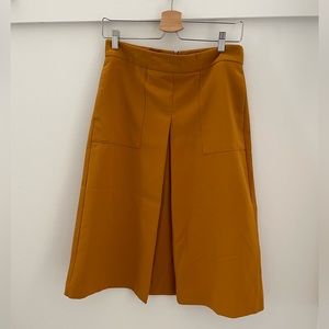 Pumpkin spice midi skirt with side pocket in size M